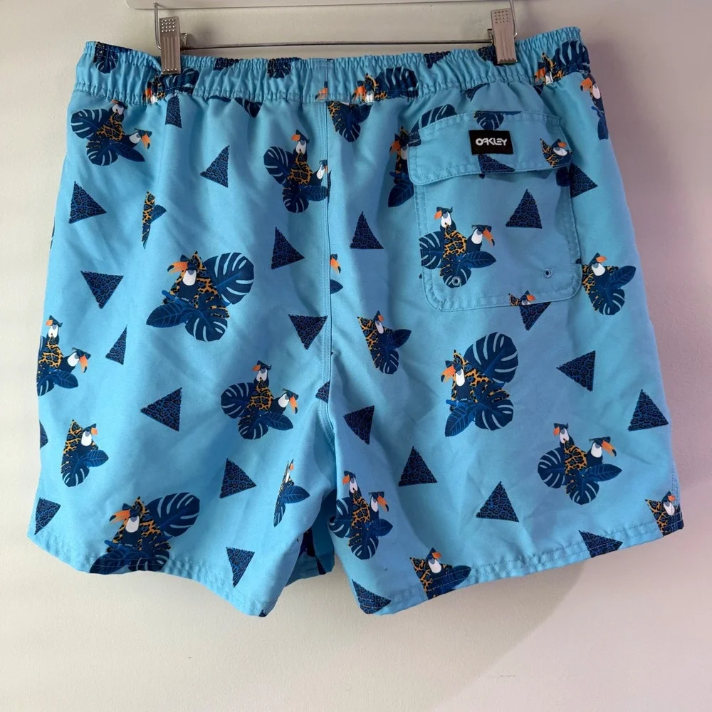 Oakley Swim Trunks Men L Light Blue Excellent Tropical Toucan Print Mesh Lined